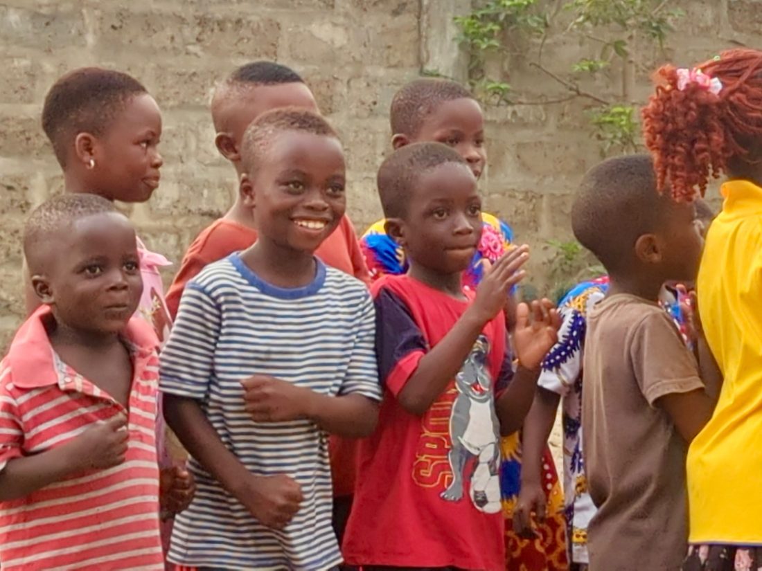 Children smiling together at the educational center in Rodi, Homa Bay County